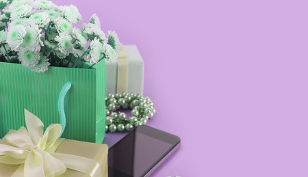 Surrealism Banner Decorative composition boxes with gifts flowers womens jewelry shopping holiday blue background.の写真素材