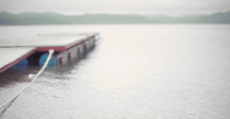 Banner Defocus Sea landscape hills horizon sky fog nature wooden pier. Natural background