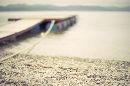 Defocus Sea landscape hills horizon sky fog nature wooden pier. Natural backgroundの写真素材