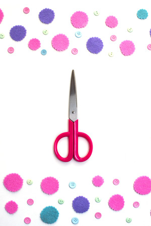 Colored confetti on white background flat lay top view. Festive background copy space toolsの写真素材