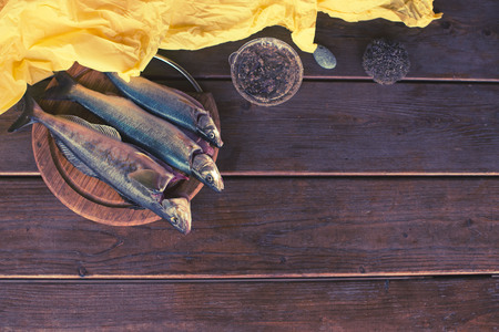 Fresh catch fish rasp three pieces on wooden table. Food ingredient with copy spaceの写真素材