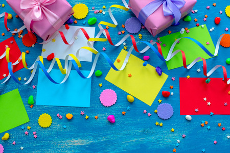 Festive background for text composition flat lay Christmas items gift box ribbon bow pink glass cocktail Christmas toys. Top view copy spaceの写真素材