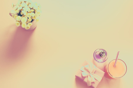 Surrealism Decorative composition flat lay set of items flowers perfume cocktail gift. Top view copy spaceの写真素材