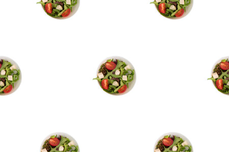 Cup with vegetable salad on white isolated background Top view flat lay pattern