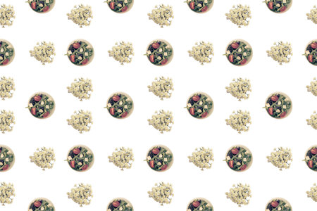 Cup with vegetable salad and chrysanthemum flowers on white isolated background Top view flat lay patternの写真素材