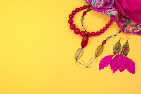 Women's accessories Flat lay on yellow background. Top view copy spaceの写真素材