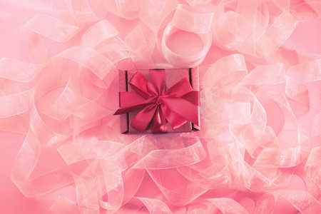 Abstract textured coral background Ribbon curls top view