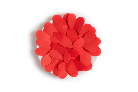 Red paper hearts on white background. The concept of Valentine's dayの写真素材