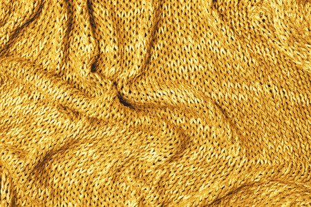 Knitted texture background yellow. Abstract tonedの写真素材
