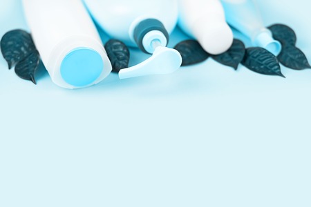 A set of cosmetics for the body tinted image blue. Hair careの写真素材