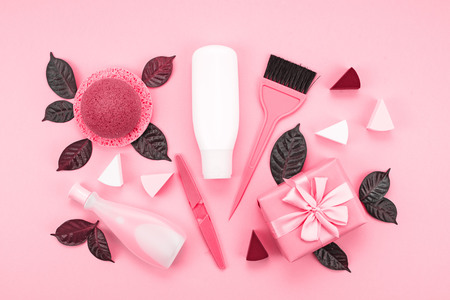 Set of cosmetics for the body, toned image coral. Top view flat layの写真素材