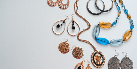 Banner Womens fashion accessories in Oriental style on a white  jewelry earrings necklace setの写真素材