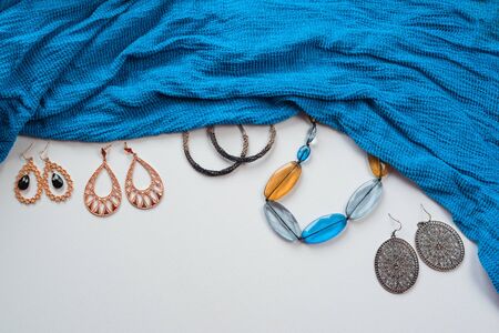 Womens fashion accessories in Oriental style on a white  Blue scarf jewelry earringsの写真素材