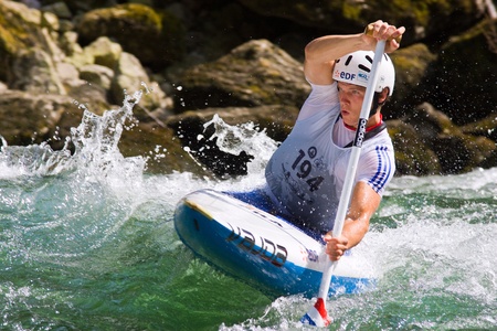 BANJA LUKA, BOSNIA AND HERZEGOVINA - JULY 16: An unidentified athlete from France competes at European Junior and U23 Canoe Slalom Championships on July 16, 2011 in Banja Luka, Bosnia and Herzegovina. The event is from July 14-17, 2011.のeditorial素材