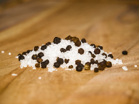 Salt and Pepper on woodの写真素材
