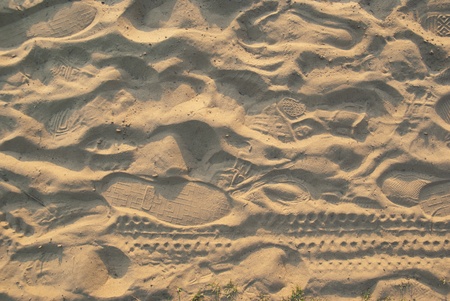 Closeup sand with footprints の写真素材