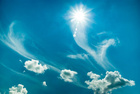 Beautiful blue sky with sun backgroundの写真素材