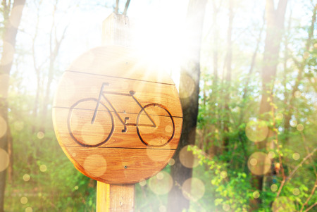 Bicycle lane sign indicating bike route woodenの写真素材