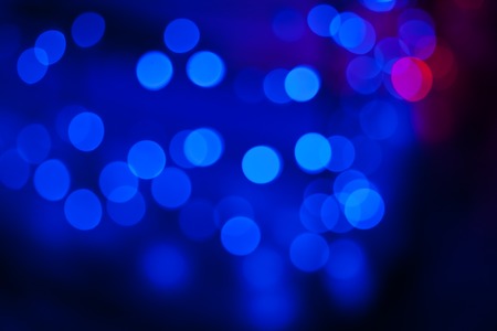 Blue bokeh abstract on black background, lightsの写真素材