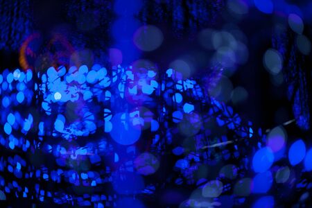 Blue bokeh abstract on black background, lightsの写真素材