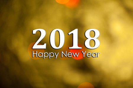 Abstract New Year background with the inscription 2018 Happy new year. Photo with text and golden...