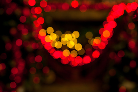 Red blurred New Year's lights. Abstract bokeh background.の写真素材
