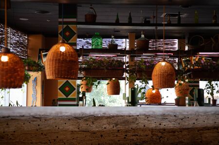 vintage wooden table on blurred cafe background dining room restaurantの写真素材