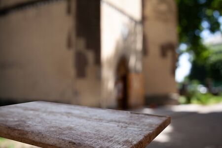 wooden empty table on the background of a blurred forest garden parkの写真素材