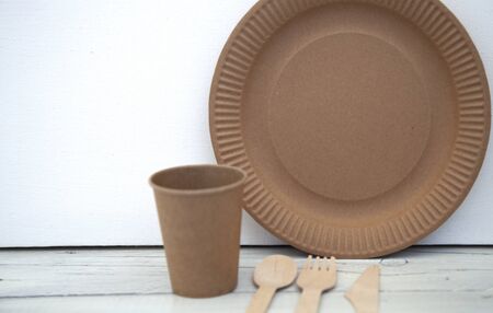 natural disposable eco ware from cardboard paper knife wood cupの写真素材