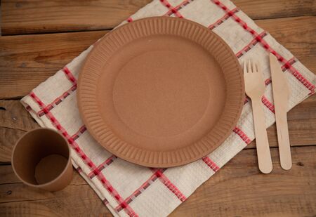 disposable eco dishes from paper cardboard spoon fork knifeの写真素材