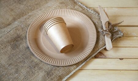Eco paper utensils with cardboard, paper, wood. On an old wooden table, concept of zero plastic.の写真素材