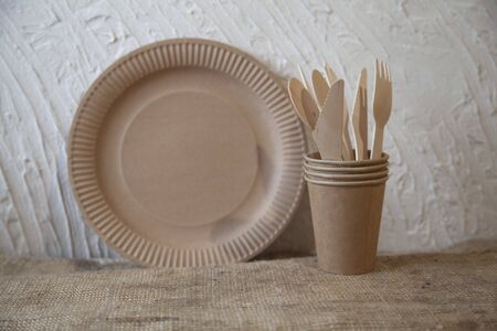 disposable eco dishes from paper cardboard spoon fork knifeの写真素材