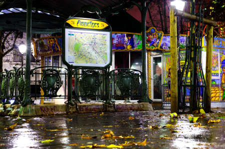 PARIS, FRANCE - 12th of OCTOBER 2012: Abbesses Subway station by night in rain. October 12th, 2012. Paris, France.のeditorial素材