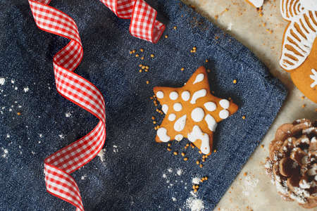 Christmas cookies with festive decoration on the kitchen towel.の写真素材