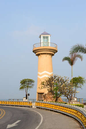 Beautiful lighthouse near the road in Pattaya city at sunny summer day, Thailand.の写真素材