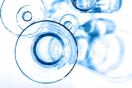 Abstract photo of glassware flat lay in blue color.の写真素材