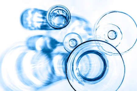 Abstract photo of glassware flat lay in blue color.の写真素材