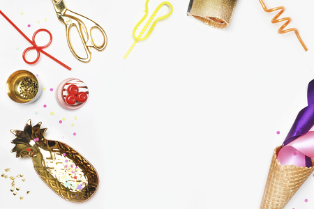 Header website or Hero website. Cone, tubes for cocktails, confetti. Party background mock-up.Cake with strawberries, colored tape. White background with party accessories.golden item.の写真素材