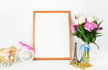 Wood picture frame with decorations. Mock up for your photo or text Place your work, print art. Peonies in vase.の写真素材