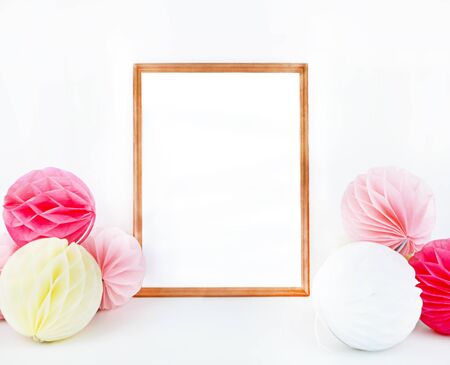 Wood picture frame with decorations. Mock up for your photo or text Place your work, print art. Paper balls colorfulの写真素材