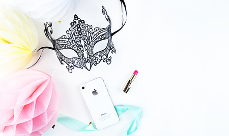 White background woman mock up. Chic and glamour style: mask, lipstick. Table view and modern objects.の写真素材