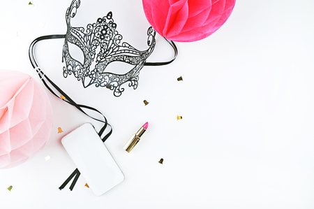 White background woman mock up. Chic and glamour style: mask, lipstick. Table view and modern objects.の写真素材