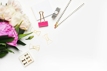 Flat lay. Flower on the table. Stationery items. Table view. Mock-up background. Peoniesの写真素材