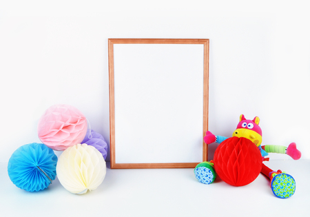 Frame mock up background, kids objects, white wall, paper colorful balls.の写真素材