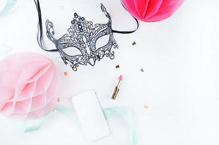 White background woman mock up. Chic and glamour style: mask, lipstick. Table view and modern objects.の写真素材