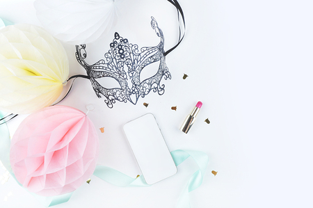 White background woman mock up. Chic and glamour style: mask, lipstick. Table view and modern objects.の写真素材