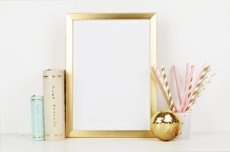 gold picture frame with decorations. Mock up for your photo or text Place your work, print art,shabby style, whiteの写真素材