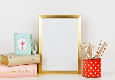 gold picture frame with decorations. Mock up for your photo or text Place your work, print art,shabby style, whiteの写真素材