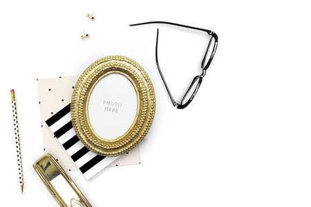 Gold Frame mock-up.Table view woman items, white background , woman desk. Flat lay. Still lifeの写真素材