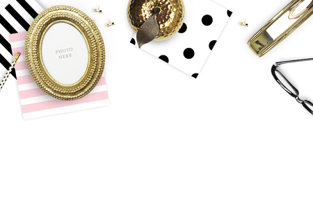 Table view woman items, white background mock up, woman desk. Flat lay. Still life. Gold Frame. Mock-up.の写真素材